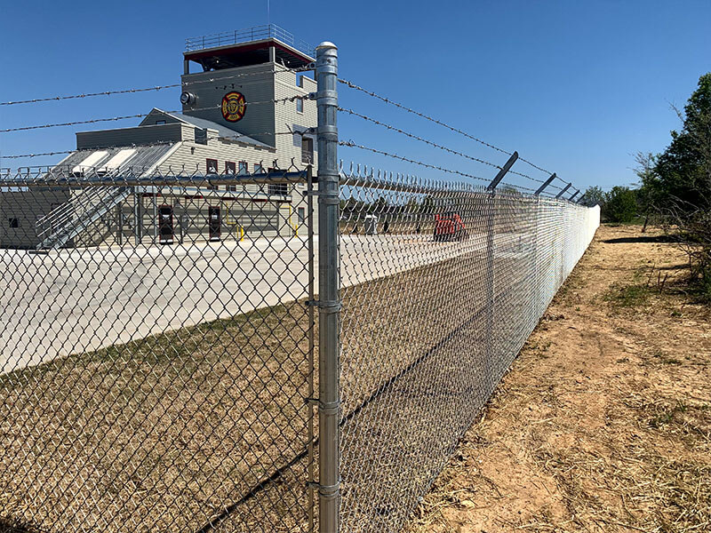 Chain link fence installation — Thomas Fence, Bentonville, Arkansas
