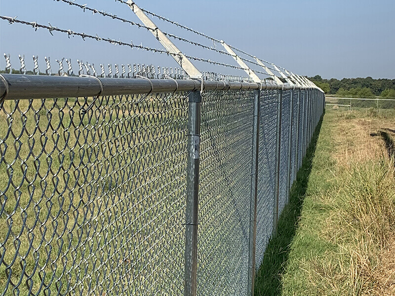 Commercial chain link fence installed by Thomas Fence in Bentonville, Arkansas