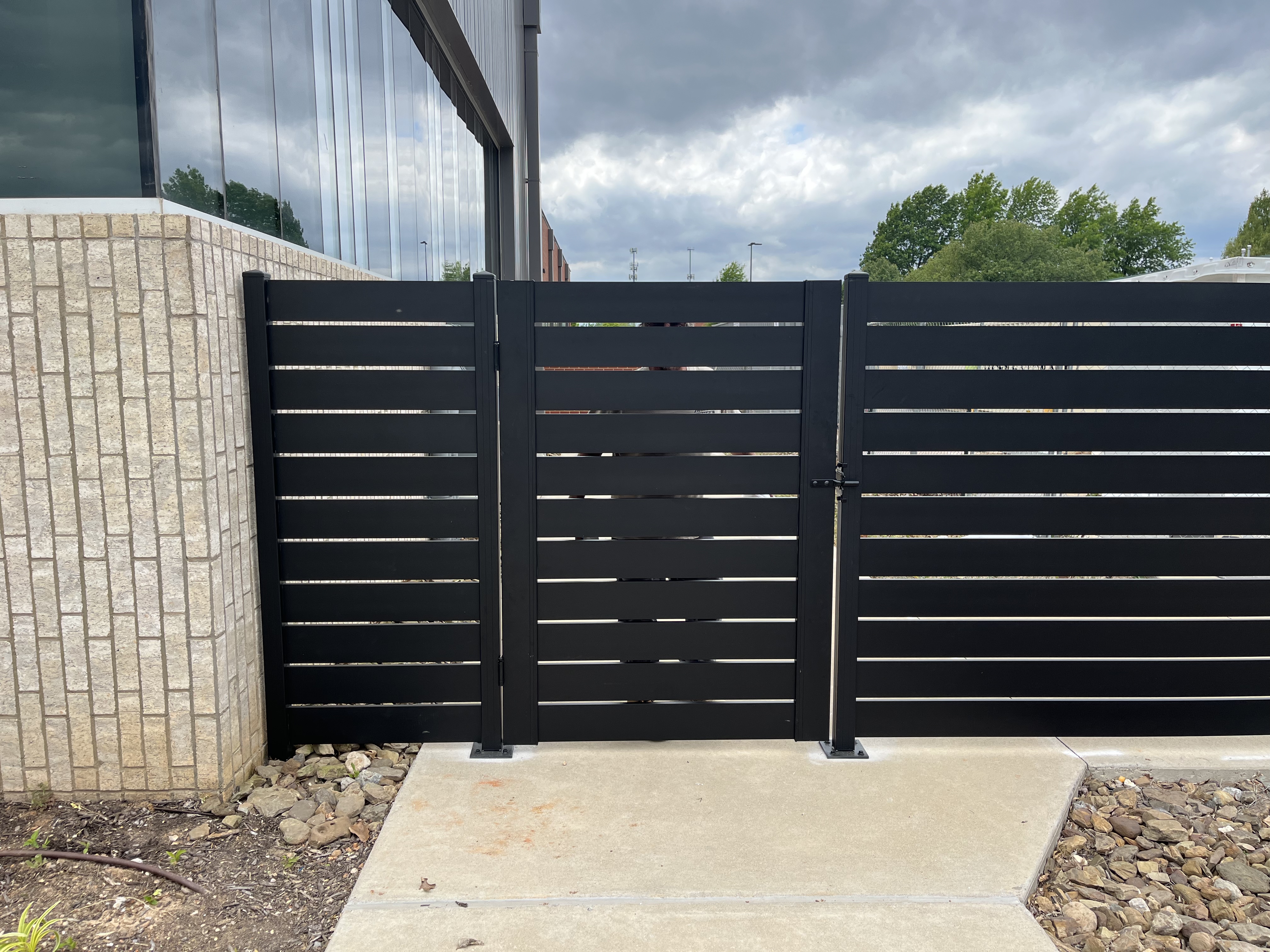 Commercial horizontal fence — Thomas Fence, Bentonville, Arkansas