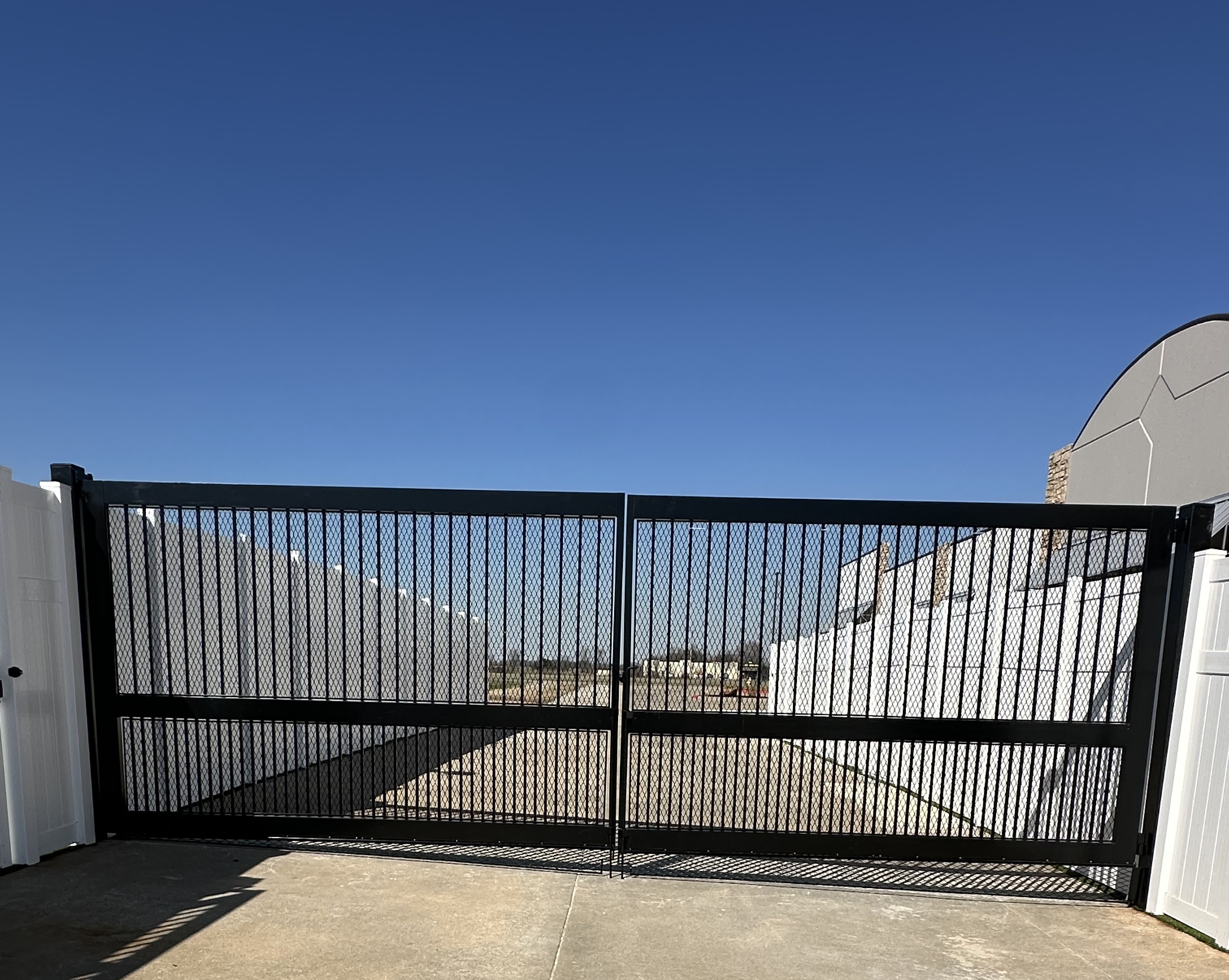 Residential double swing gate — Thomas Fence, Bentonville, Arkansas