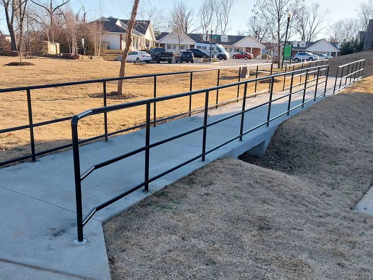 Bike trail handrail — Thomas Fence, Bentonville, Arkansas