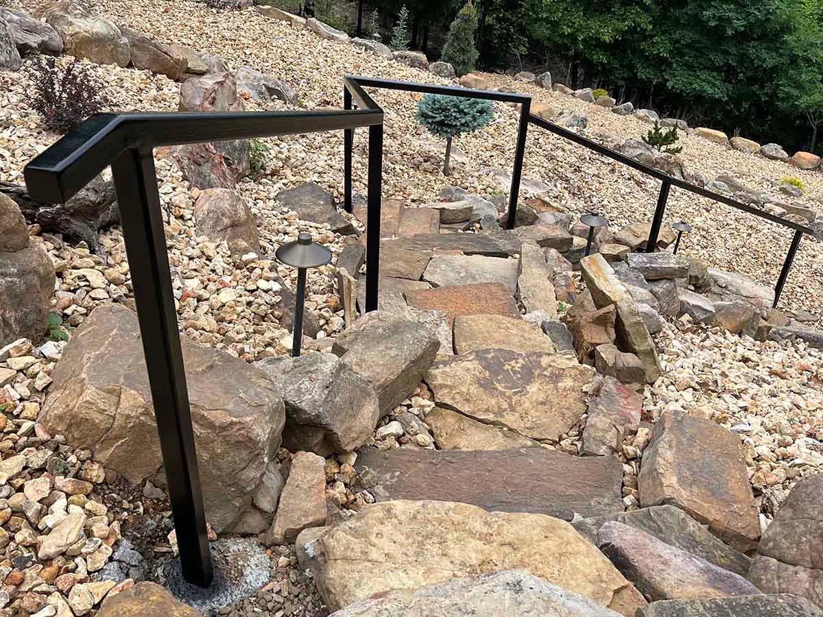 Metal handrail installed by Thomas Fence in Rogers, Arkansas