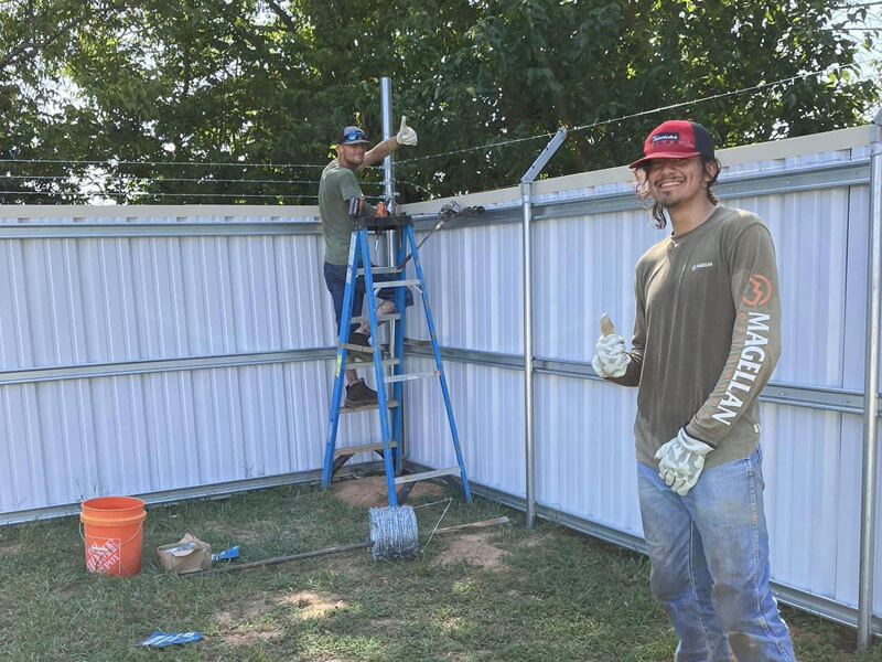 Commercial R-panel fence — Thomas Fence, Lowell, Arkansas