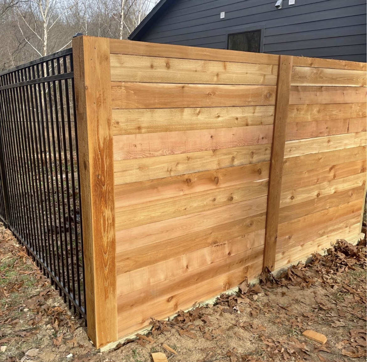 Horizontal cedar wood fence installed by Thomas Fence in Bella Vista, Arkansas