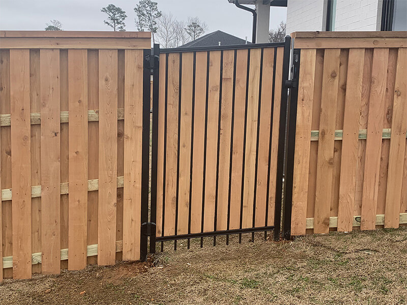 Cedar fence installation — Thomas Fence, Bentonville, Arkansas