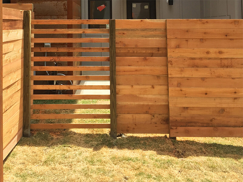 Horizontal wood fence at residential property — Thomas Fence, Bentonville, Arkansas