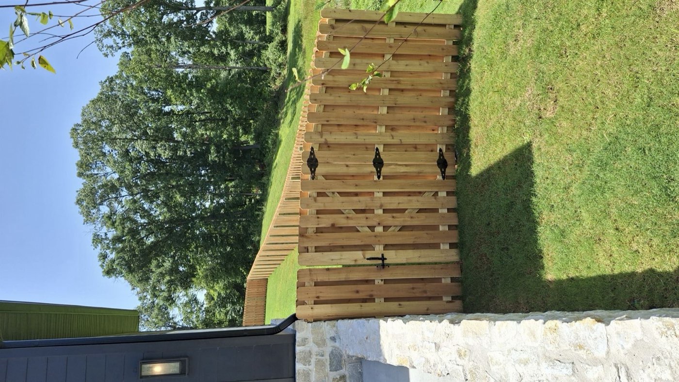 Cedar shadow box wood fence installed by Thomas Fence in Centerton, Arkansas