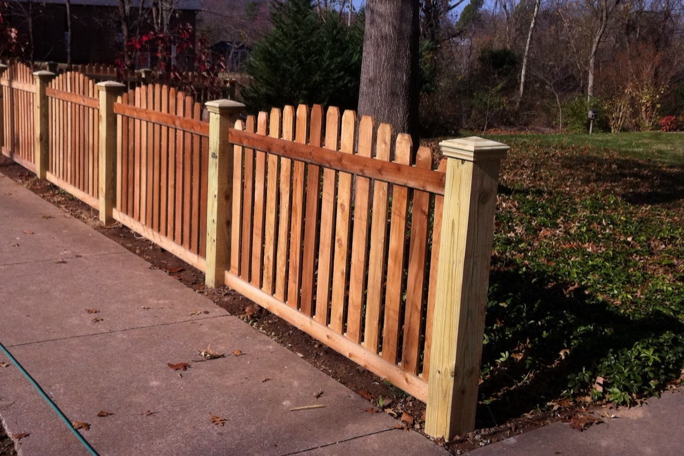 Cedar picket wood fence installed by Thomas Fence in Fayetteville, Arkansas
