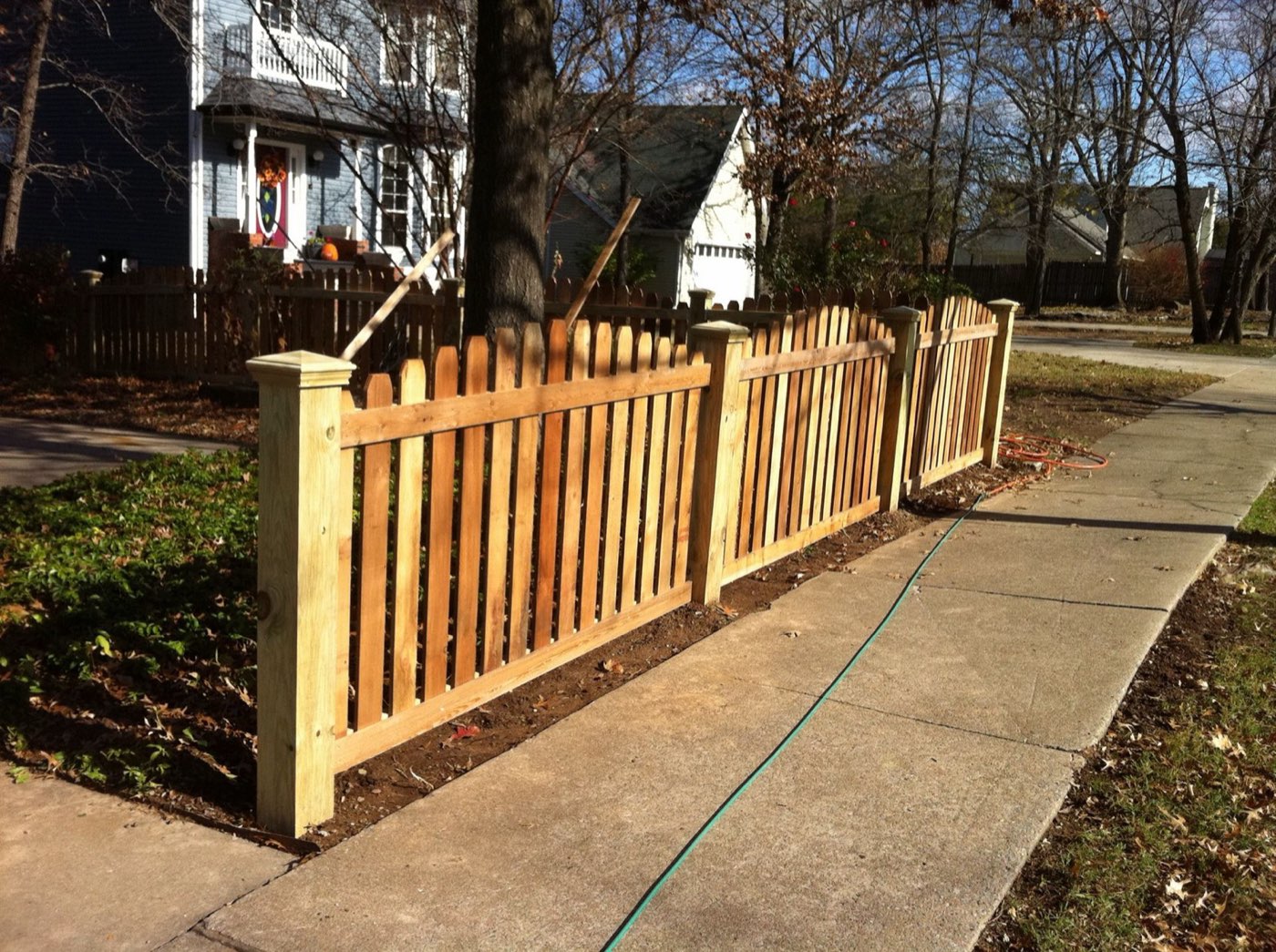 Cedar picket wood fence installed by Thomas Fence in Fayetteville, Arkansas