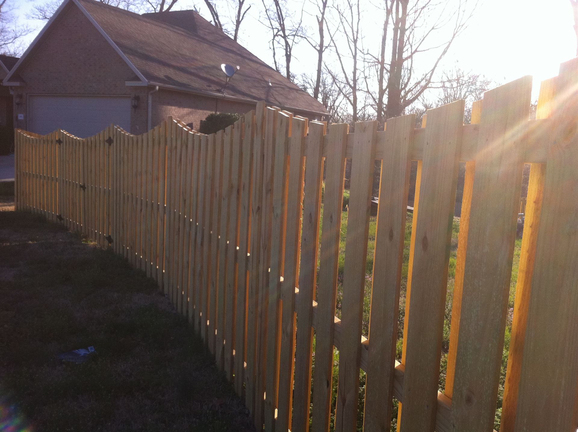 Wood shadow box fence installed by Thomas Fence in Rogers, Arkansas